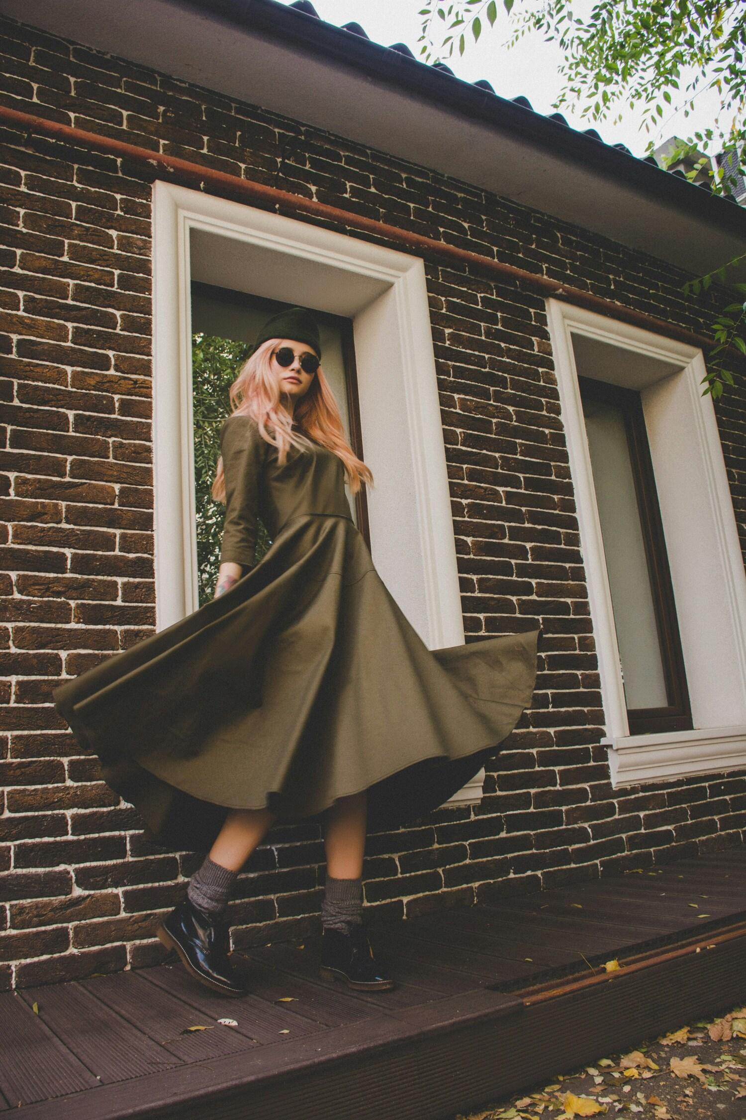 Editorial portrait featuring tailored couture